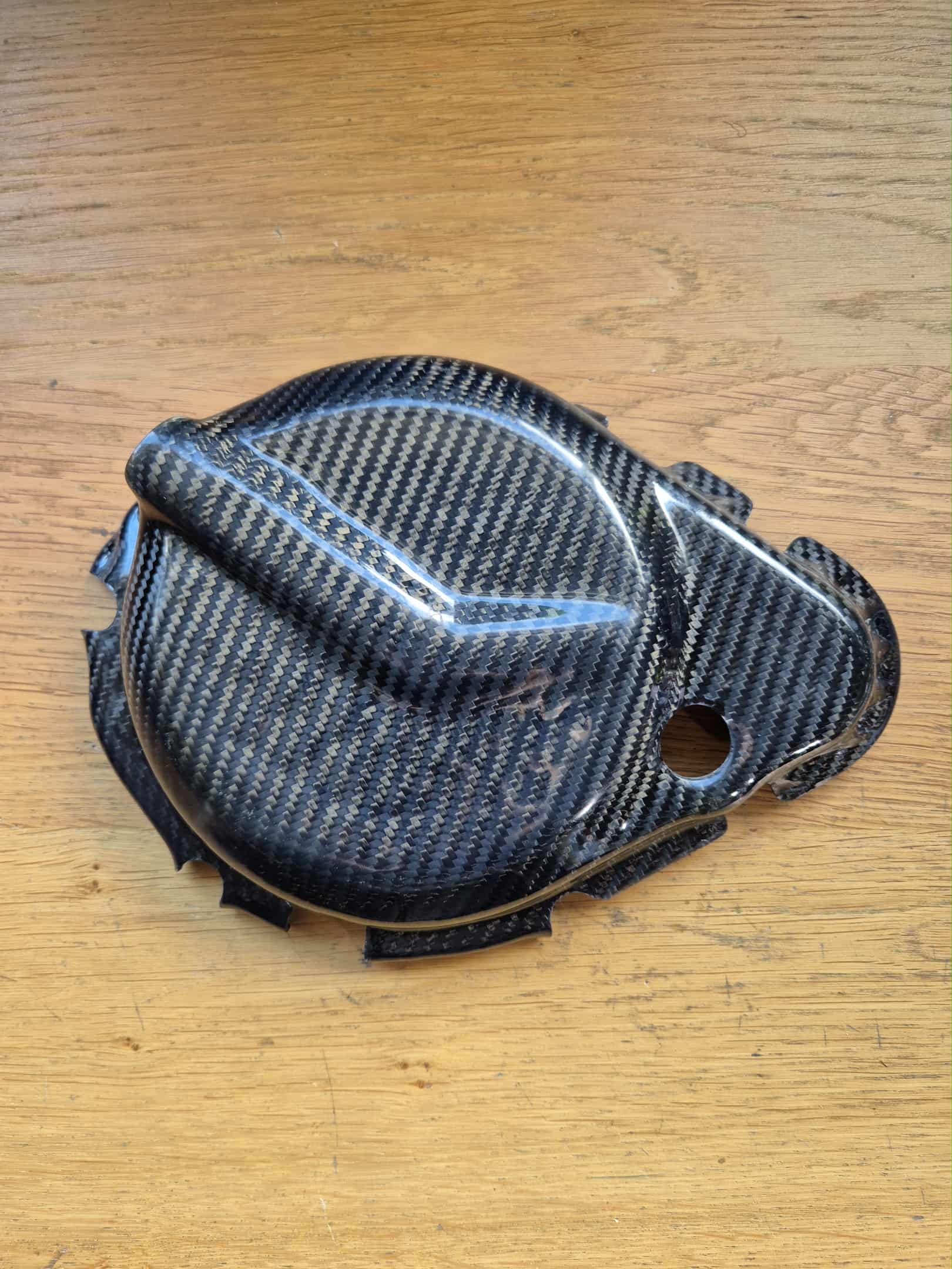 Protection carbone carter embrayage pour la gamme Electric Motion équipée du nouveau moteur 2025.